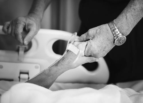 holding hands in the hospital